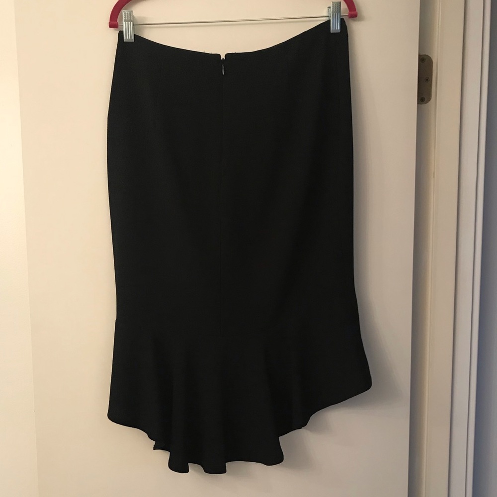 Knee length black skirt with gathered hem in back sz 12